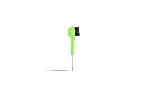 A bright green, dual-sided edge brush and comb tool stands against a black background.