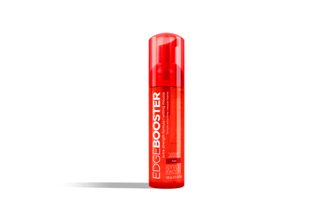 A red bottle of Style Factor Edge Booster extra strength formula setting mousse stands against a black background.