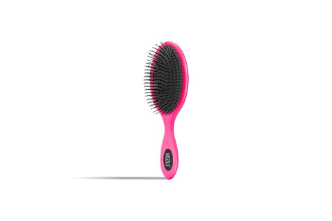 A Cherry Color WigOut hairbrush stands against a black background, ready to tackle tangles.