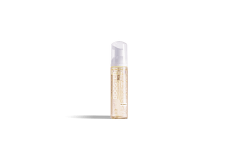 A single bottle of Style Factor Edge Booster Mousse, infused with Argan Oil, stands against a black background. 
