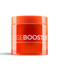 A bright orange jar of Edge Booster extra strength hair pomade sits against a black background. 
