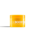 A bright yellow jar of Edge Booster hair pomade sits against a black background. 
