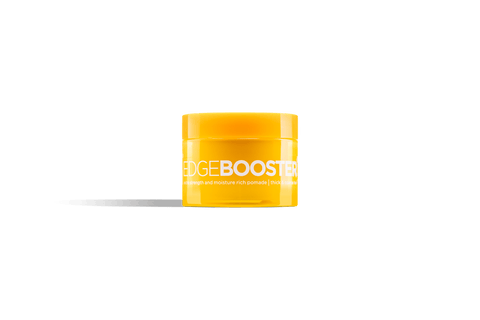 A bright yellow jar of Edge Booster hair pomade sits against a black background. 
