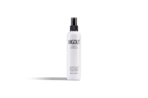 White bottle of Style Factor Wigout leave-in conditioner with a black spray nozzle. 
