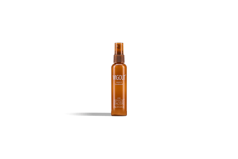 Amber bottle of Wigout Leave-in Conditioner against a black background. 
